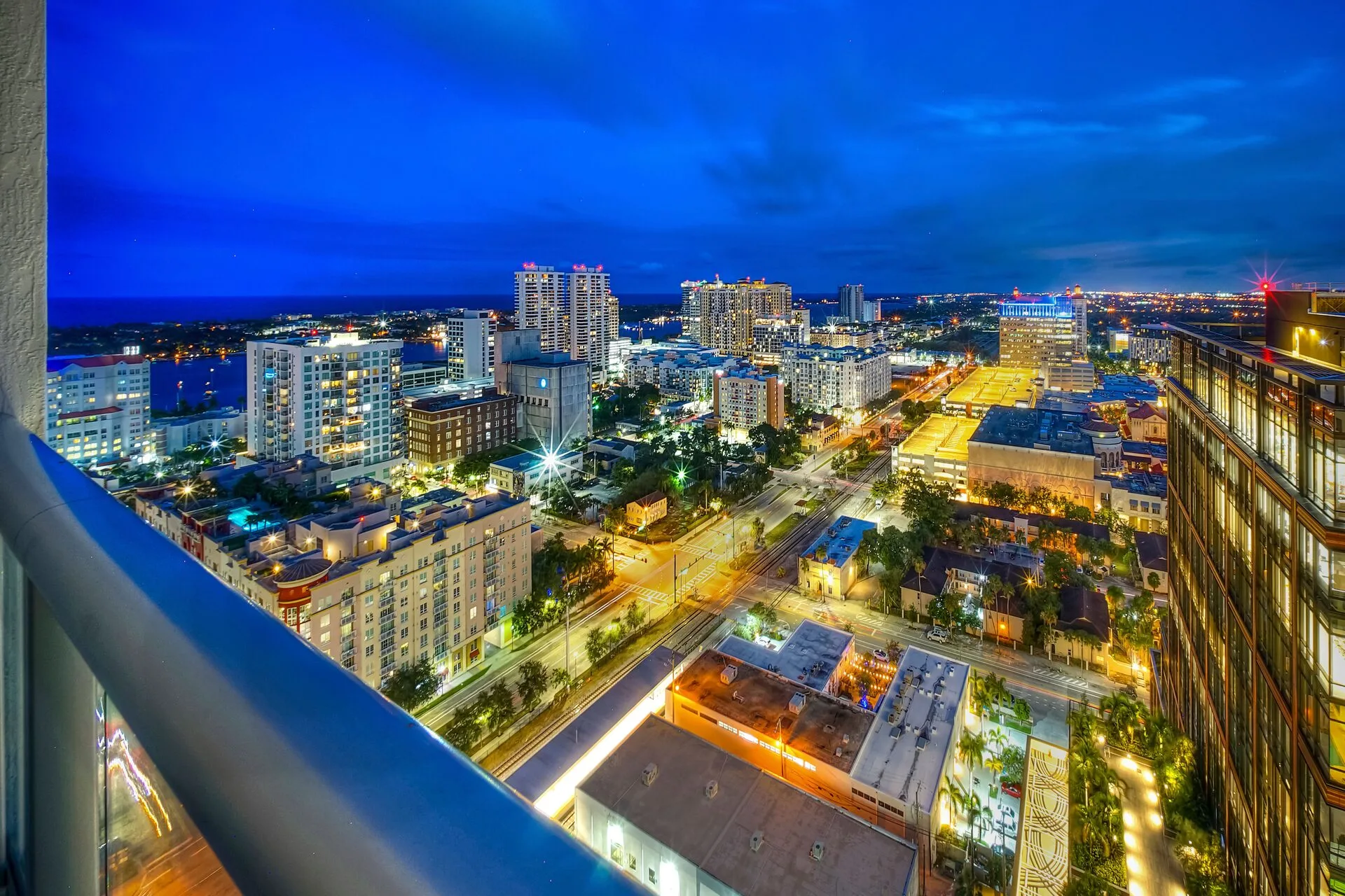 View of city at night from rooftop